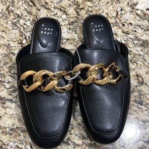 Black new with tags casual slippers/ flats